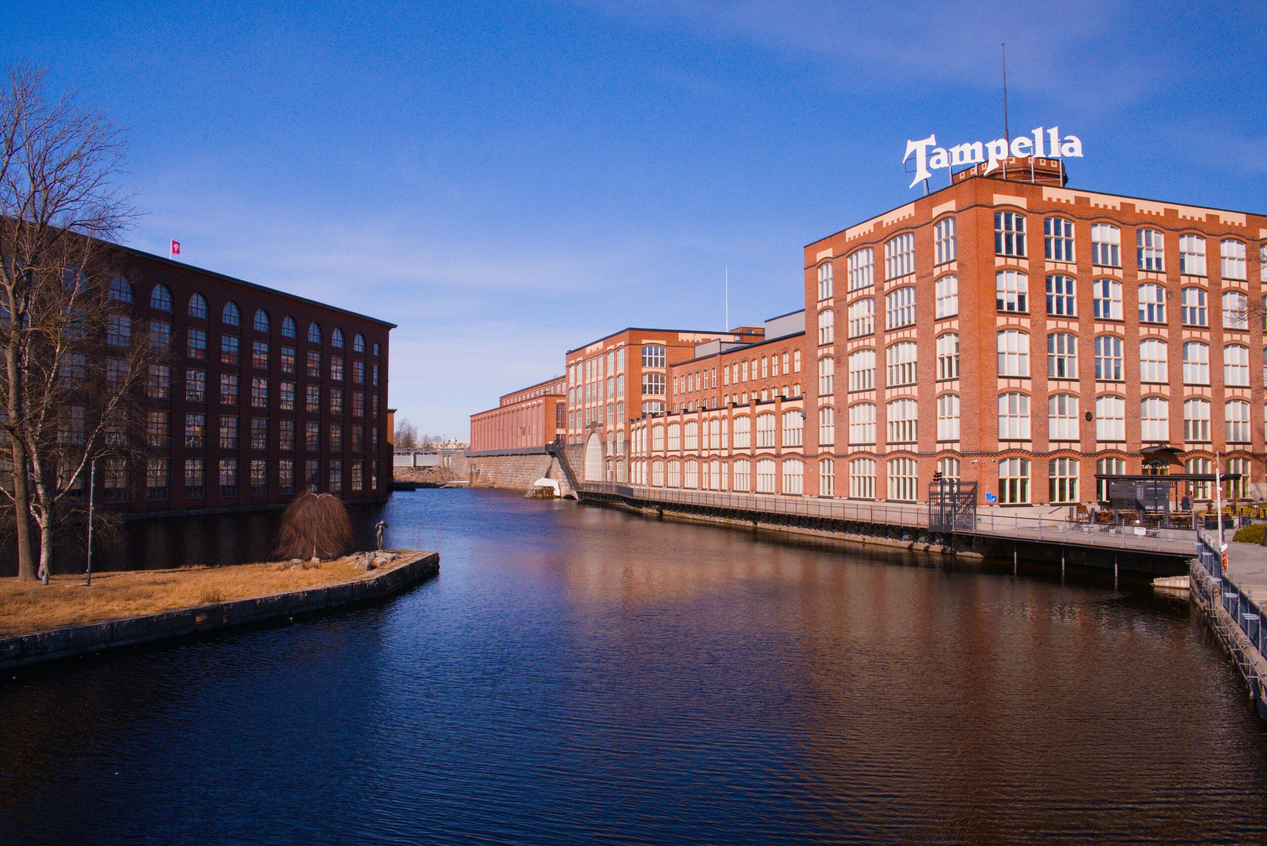 View of the iconic Tampella building along the Tammerkoski in Tampere, Finland.